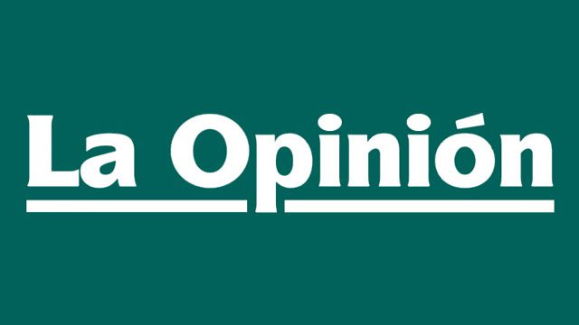 The logo of La Opinion in white on a green background